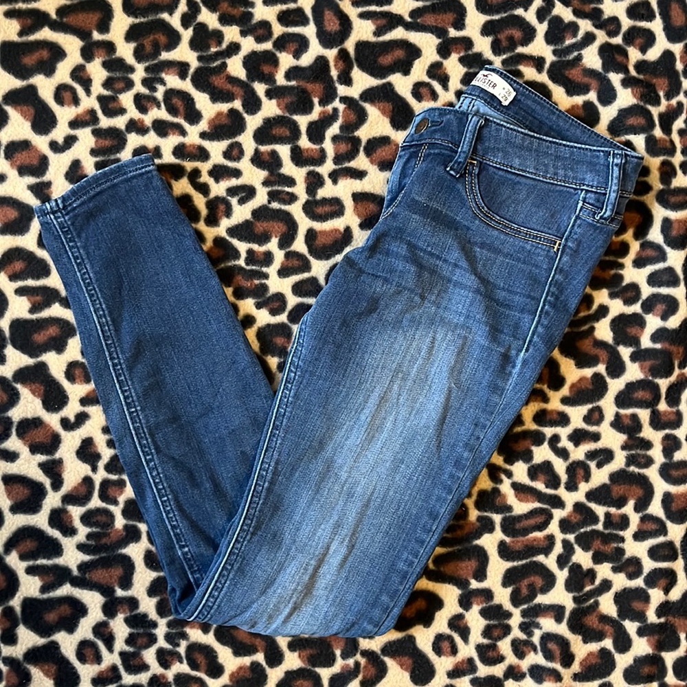 Hollister dark wash skinny jeans. Distressed knee. Size 3R